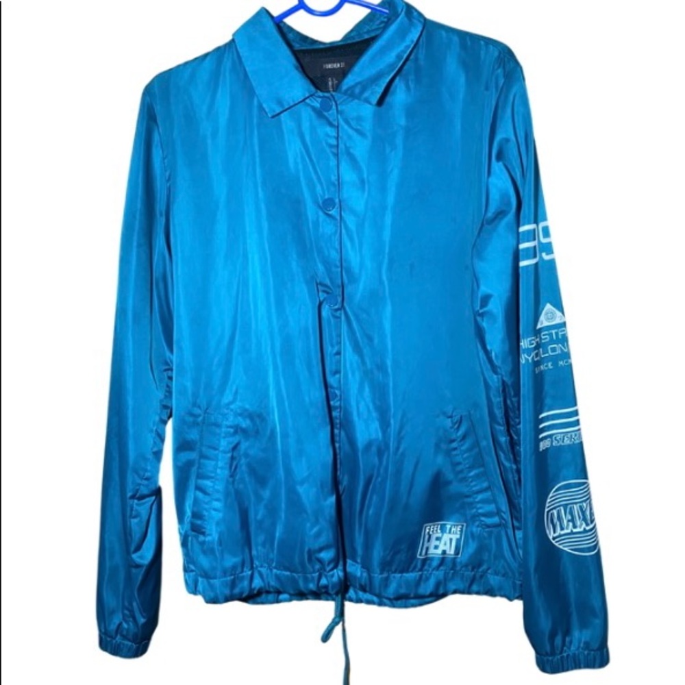 Blue “FEEL THE HEAT” Graphic Collared Wind Breaker. Unisex Large.